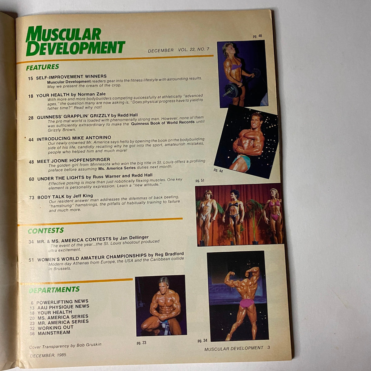 Table of contents page from Muscular Development Magazine, December 1985 (Vol 22, No 7) outlining features such as self-improvement winners, health insights, and bodybuilding contests.