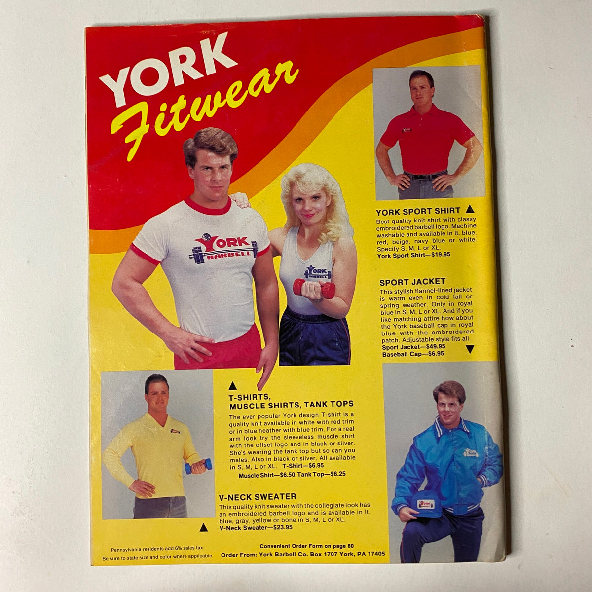 Promotional image for York Fitwear from Muscular Development Magazine September 1986 Vol 23 No. 9 featuring fitness apparel including shirts, jackets, and sweaters modeled by athletic individuals.