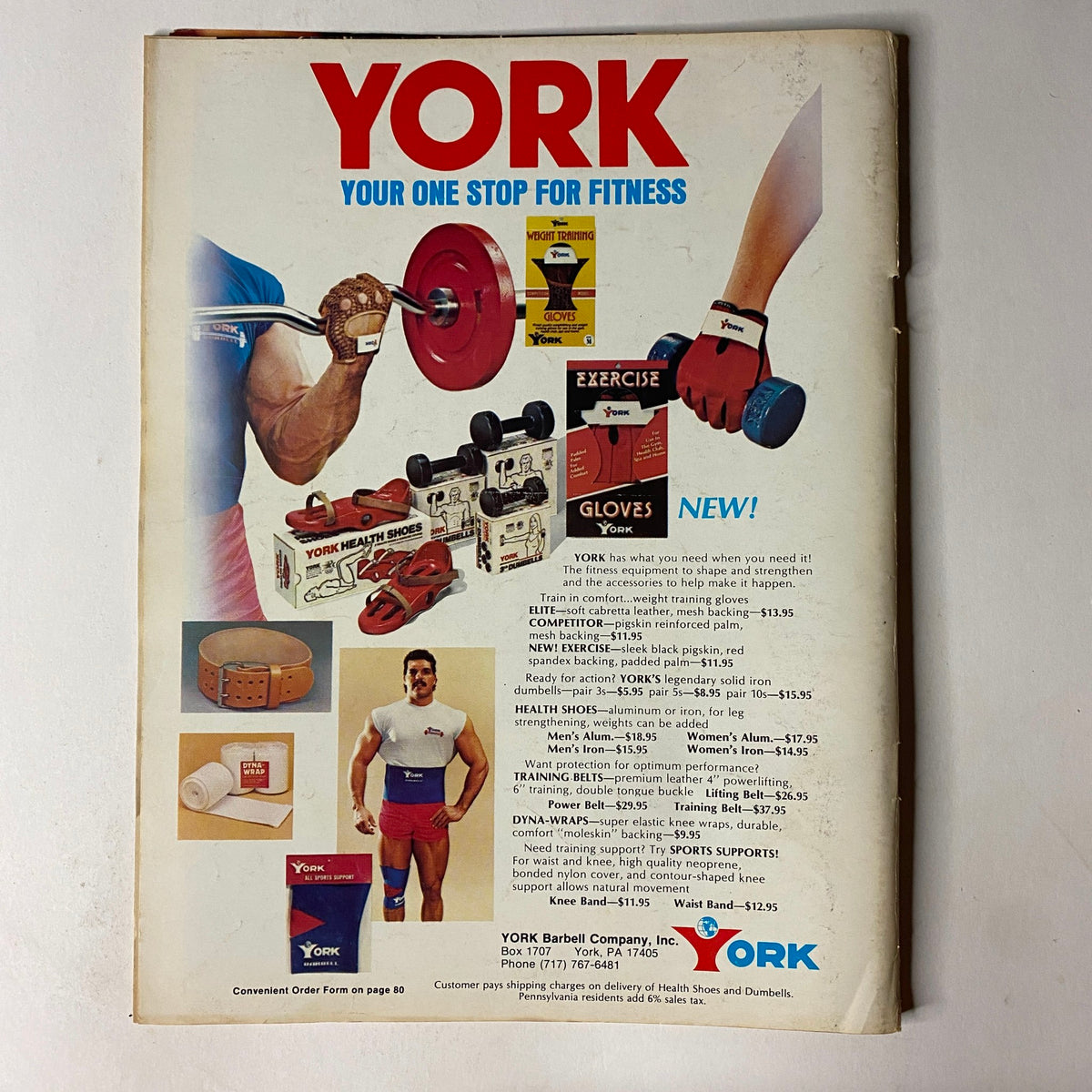 Back cover of Muscular Development Magazine, October 1986, showcasing fitness products from York Barbell Company, emphasizing fitness equipment and accessories.