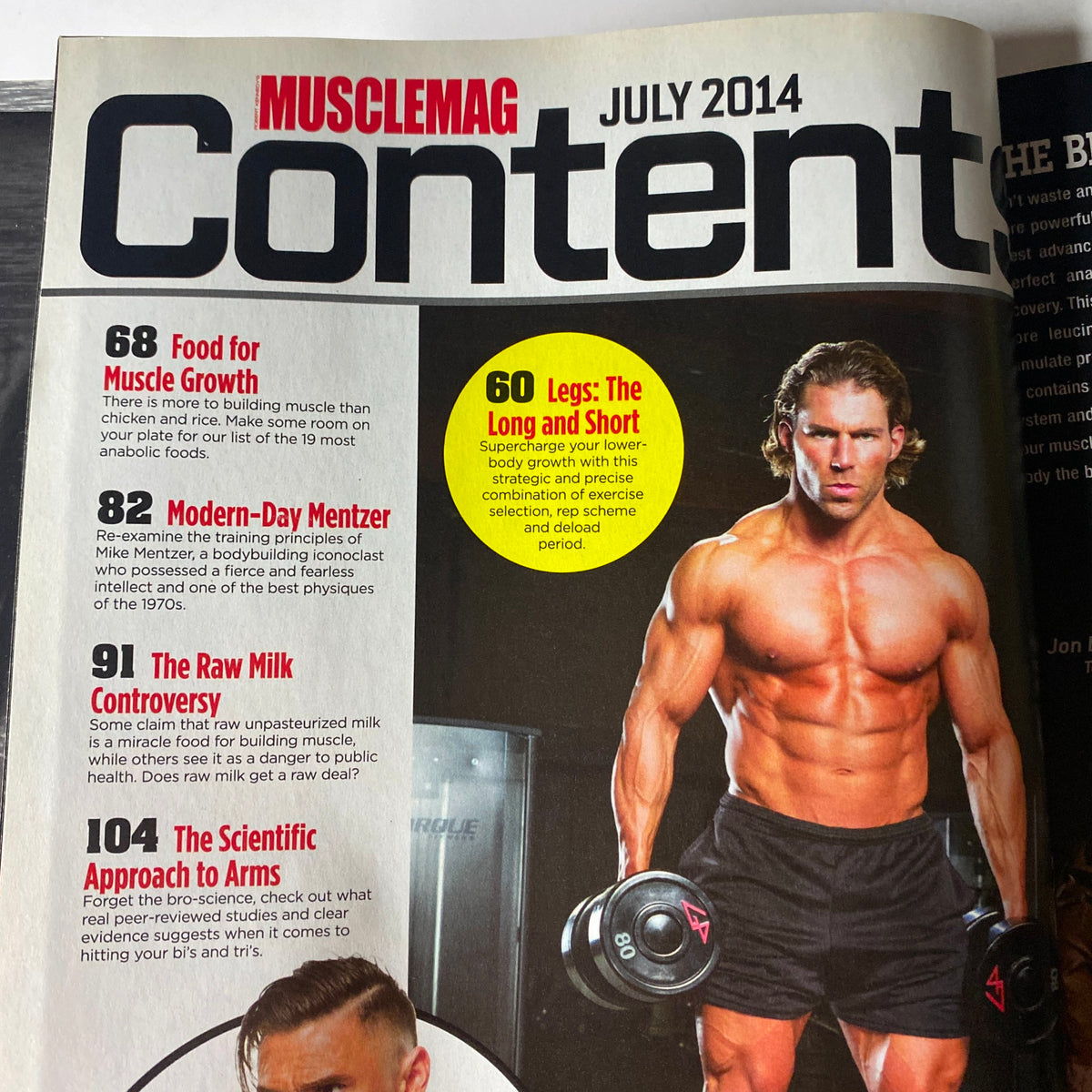 Table of contents from MuscleMag International Magazine July 2014, featuring sections on food for muscle growth, modern-day mentorship, and fitness approaches, with Craig Capurso prominently displayed.