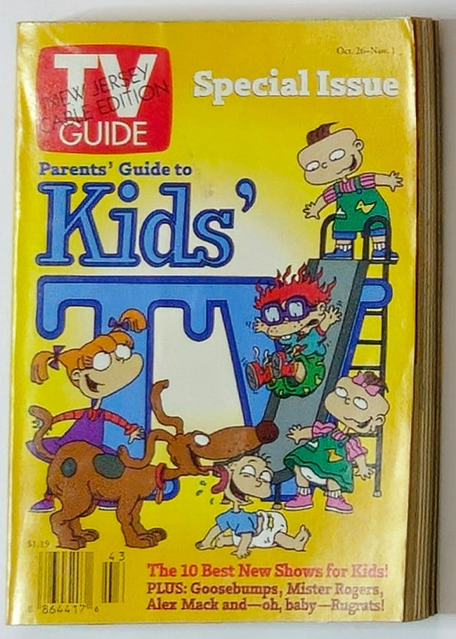Cover image of TV Guide Magazine from October 26, 1996, featuring the Rugrats and titled 'Parents' Guide to Kids' TV'. The vibrant cover showcases beloved characters from the 90s animated series including Tommy, Chuckie, and Angelica along with playful elements and a colorful layout.