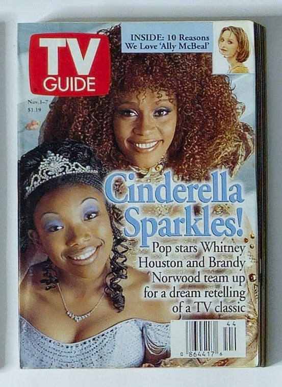 TV Guide Magazine November 1, 1997 featuring Whitney Houston on the cover promoting Cinderella with Brandy Norwood, showcasing vintage pop culture and television history.