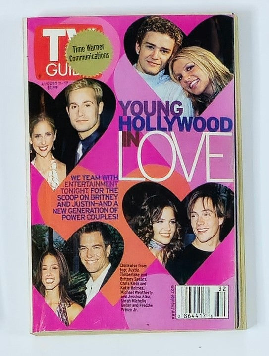 Cover of TV Guide Magazine from August 11, 2001, featuring Justin Timberlake and Britney Spears, with a theme of 'Young Hollywood in Love'. The vibrant pink background includes images of various celebrities, capturing a significant moment in early 2000s pop culture.