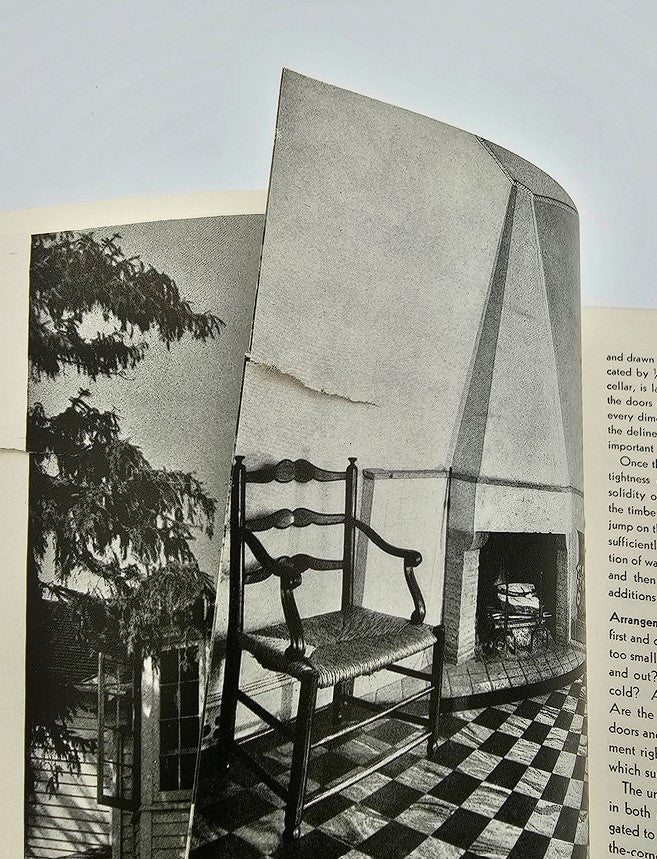 Interior page of the VTG House Beautiful Magazine August 1933, Vol 74 #2 showcasing a vintage chair near a fireplace within a stylish home setting.