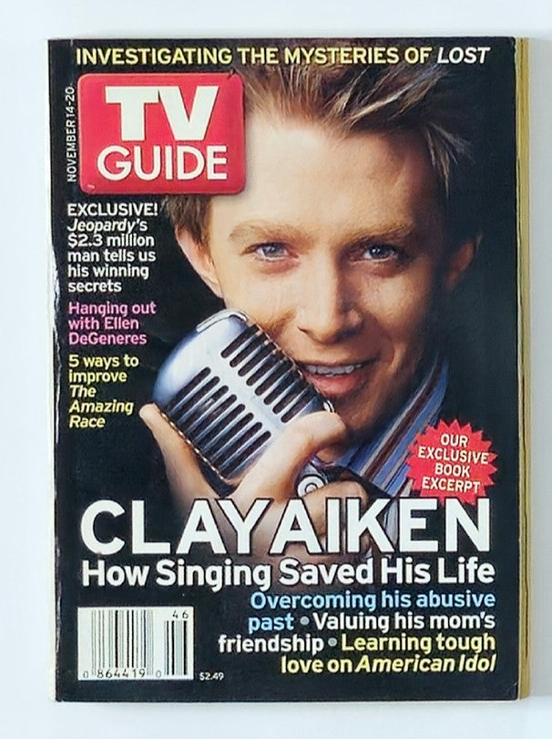 TV Guide Magazine cover from November 14, 2004, featuring Clay Aiken with a microphone. The magazine highlights exclusive interviews and stories, including how singing saved Aiken's life and his journey on American Idol.