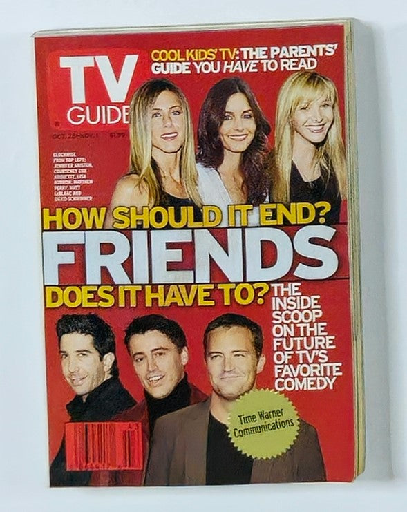 TV Guide Magazine from October 26, 2002 featuring Jennifer Aniston, cover story on 'Friends'. The magazine highlights a discussion on how the show should end, showcasing iconic moments from the series along with other cast members.