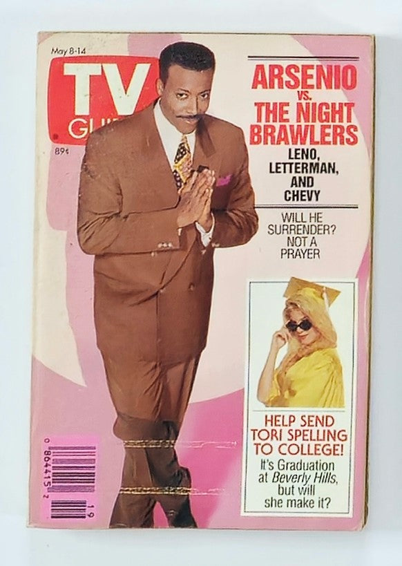 Cover of TV Guide Magazine dated May 8, 1993, featuring Arsenio Hall in a suit, with the headline 'Arsenio vs The Night Brawlers'. The magazine includes the tagline about Leno, Letterman, and Chevy, and an advertisement section for Tori Spelling's graduation.