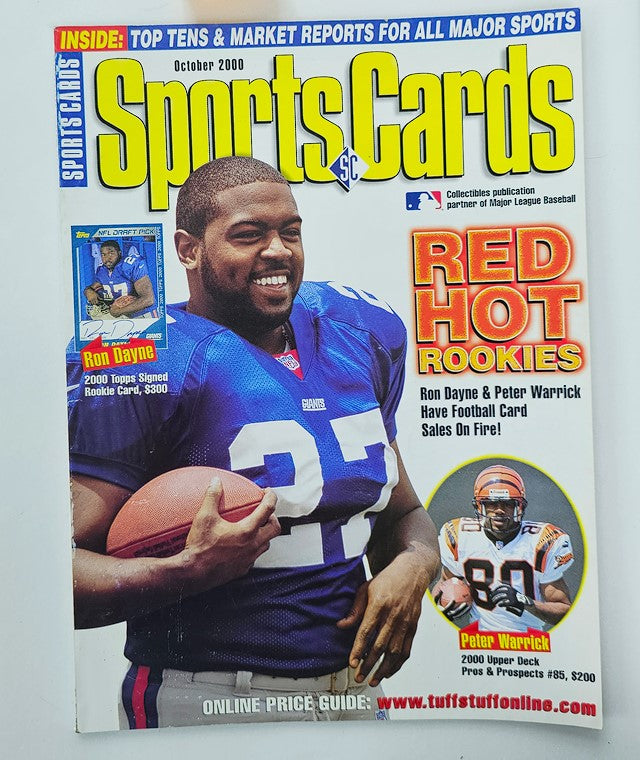 Sports Cards Magazine October 2000 featuring Ron Dayne and Peter Warrick, showcasing their football careers and notable achievements. Ideal for sports memorabilia collectors.