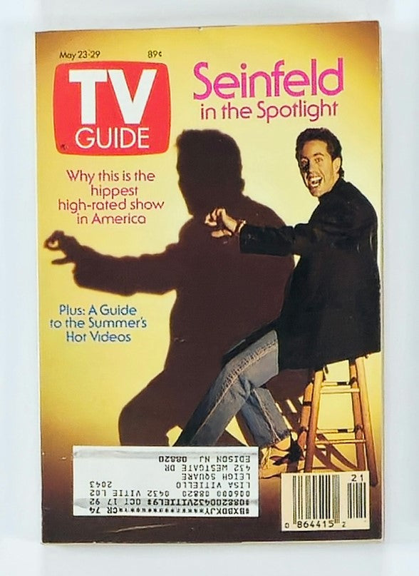 Cover of TV Guide Magazine, May 23, 1992, featuring Jerry Seinfeld in the spotlight. The cover highlights 'Why this is the hippest high-rated show in America' with bright colors and an iconic image of Seinfeld.