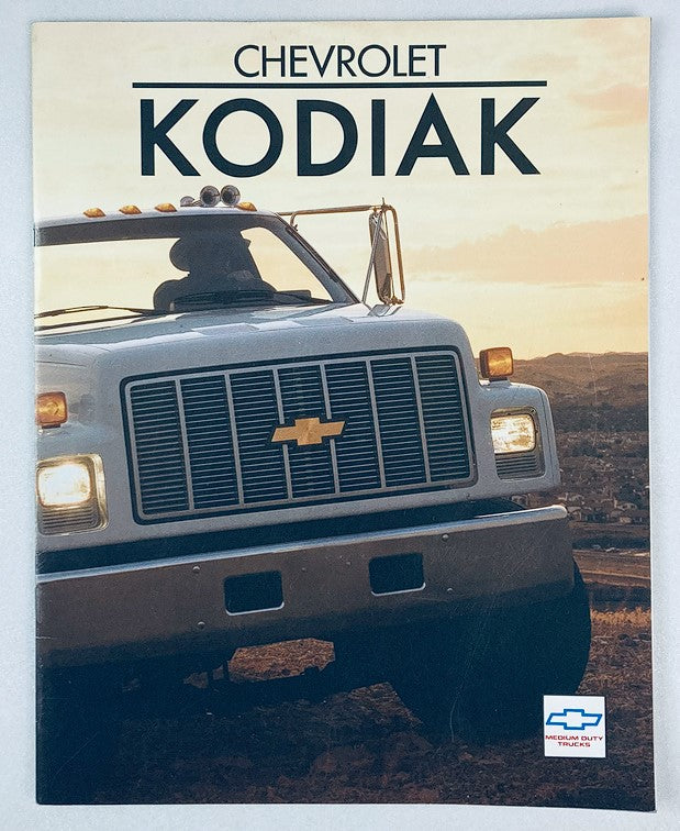 1992 Chevrolet Kodiak Truck Dealer Sales Brochure featuring a striking front view of a Chevrolet Kodiak truck against a scenic background, highlighting its robust design and iconic logo.