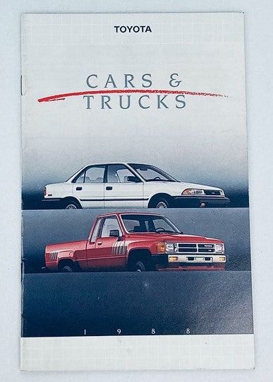 1988 Toyota Cars & Trucks Dealer Showroom Sales Brochure featuring the front cover, showcasing a white sedan and a red pickup truck, highlighting the automotive offerings of Toyota for that year.