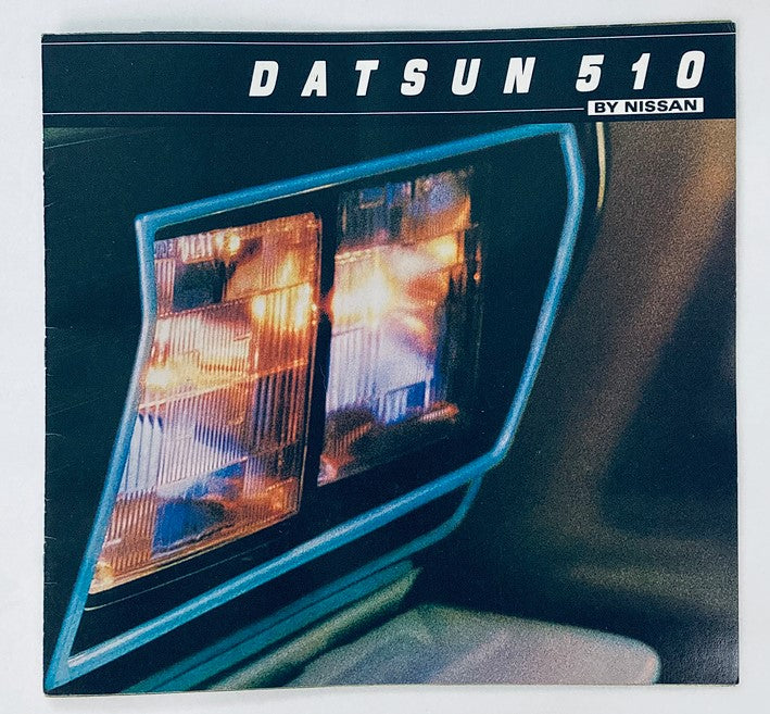 Cover image of the 1981 Nissan Datsun 510 Dealer Showroom Sales Brochure Guide Catalog featuring headlights and a sleek design.