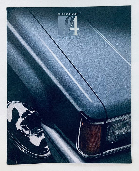 Cover image of the 1994 Mitsubishi Trucks Dealer Showroom Sales Brochure Guide Catalog, showcasing a close-up of a truck's front fender and wheel.