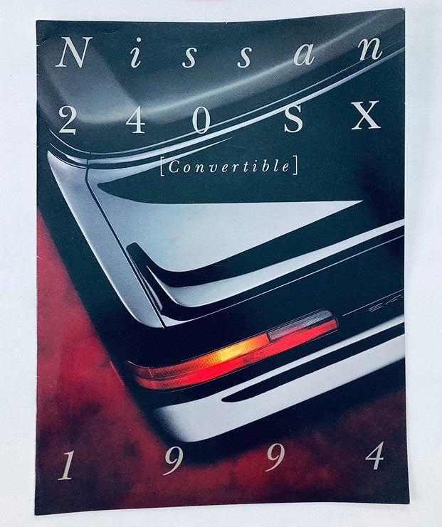 1994 Nissan 240 SX Convertible Dealer Showroom Sales Brochure showcasing the sleek rear design of the convertible model with vibrant red background. Perfect for car enthusiasts and collectors.