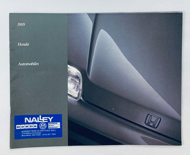 Cover of the 1989 Honda Automobiles Dealer Showroom Sales Brochure Guide Catalog featuring the Honda logo and a sleek vehicle design.