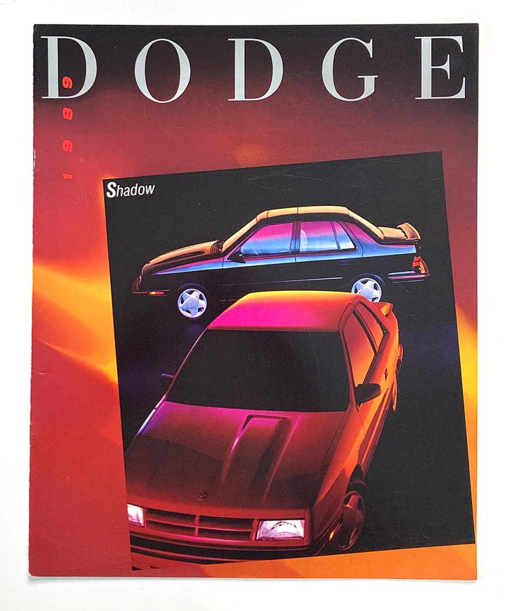 1989 Dodge Shadow Dealer Showroom Sales Brochure featuring an artistic depiction of two Dodge Shadow vehicles against a vibrant background.