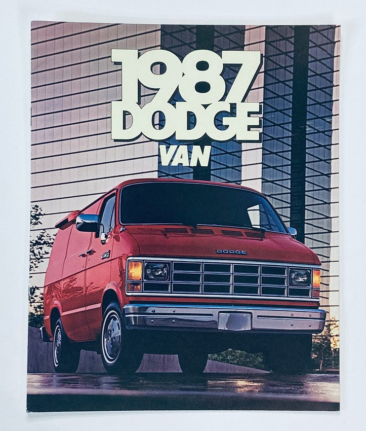Cover of the 1987 Dodge Van Dealer Showroom Sales Brochure Guide Catalog featuring a bright red Dodge van in front of a modern building.