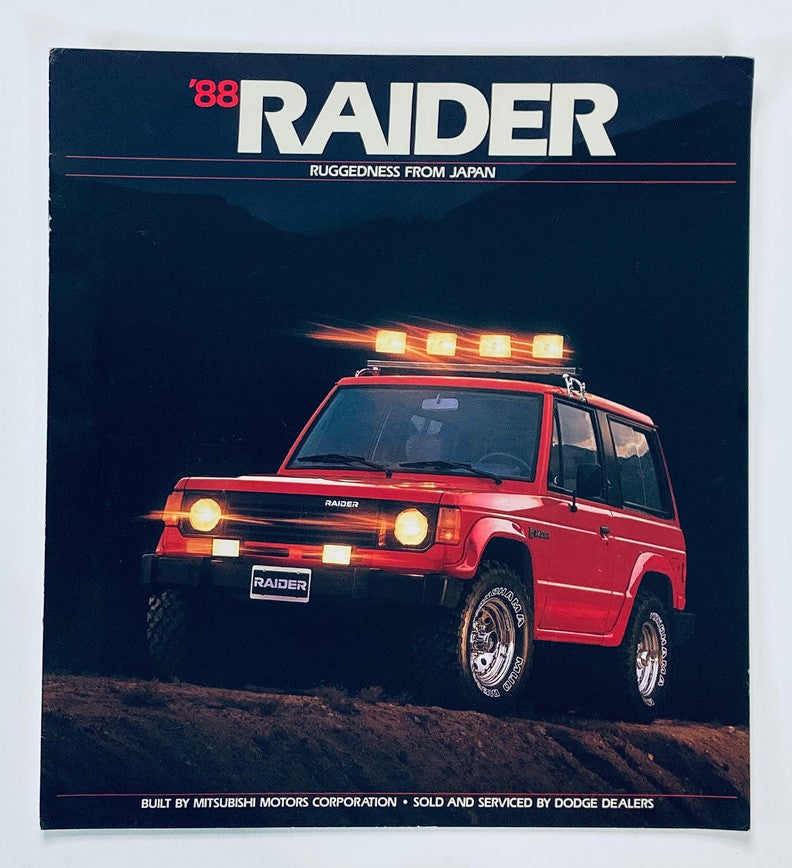 1988 Dodge Raider Dealer Showroom Sales Brochure Guide Catalog featuring a red Dodge Raider vehicle, showcasing ruggedness with distinctive off-road features and lights, highlighting its Japanese manufacturing by Mitsubishi.