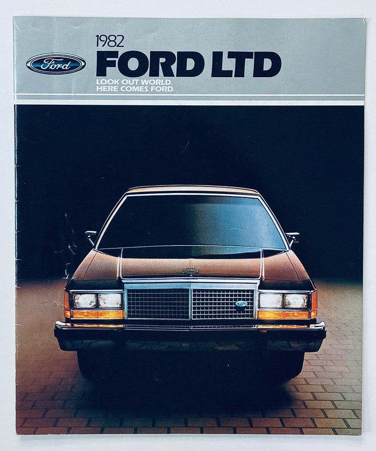 1982 Ford LTD Dealer Showroom Sales Brochure Guide Catalog featuring a front view of a black Ford LTD in a showroom setting, capturing the essence of classic automotive design.