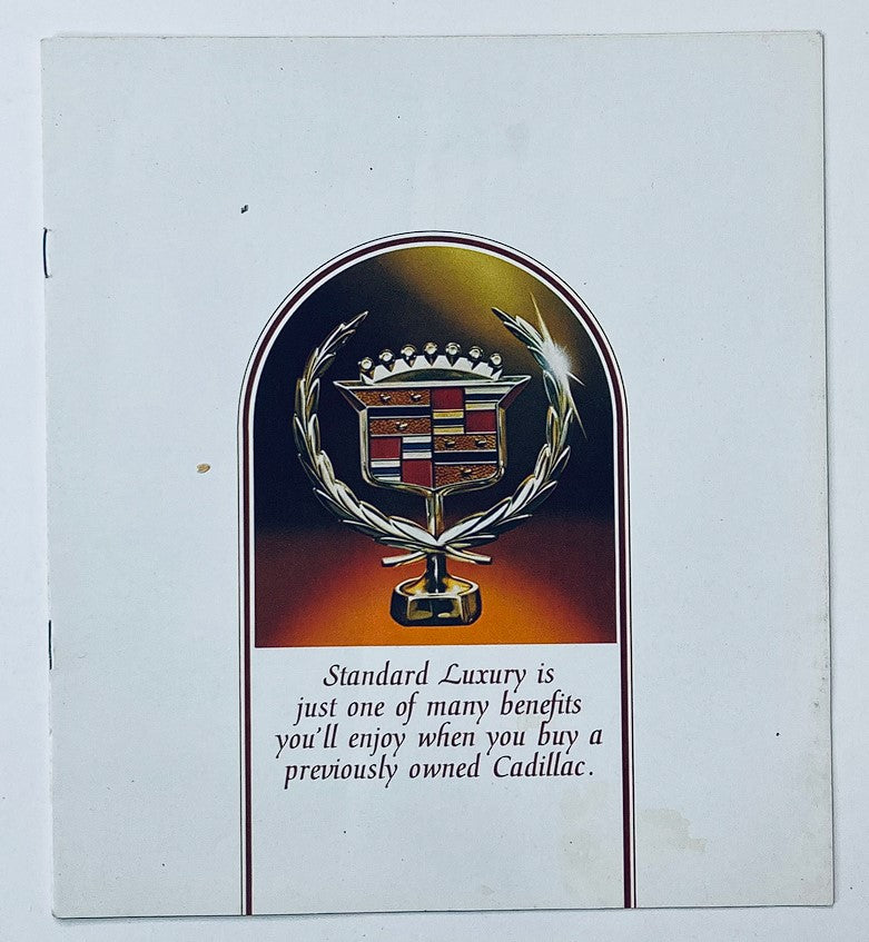 1995 Cadillac Line Dealer Showroom Sales Brochure Guide Catalog cover featuring a Cadillac crest and the text 'Standard Luxury is just one of many benefits you'll enjoy when you buy a previously owned Cadillac.'