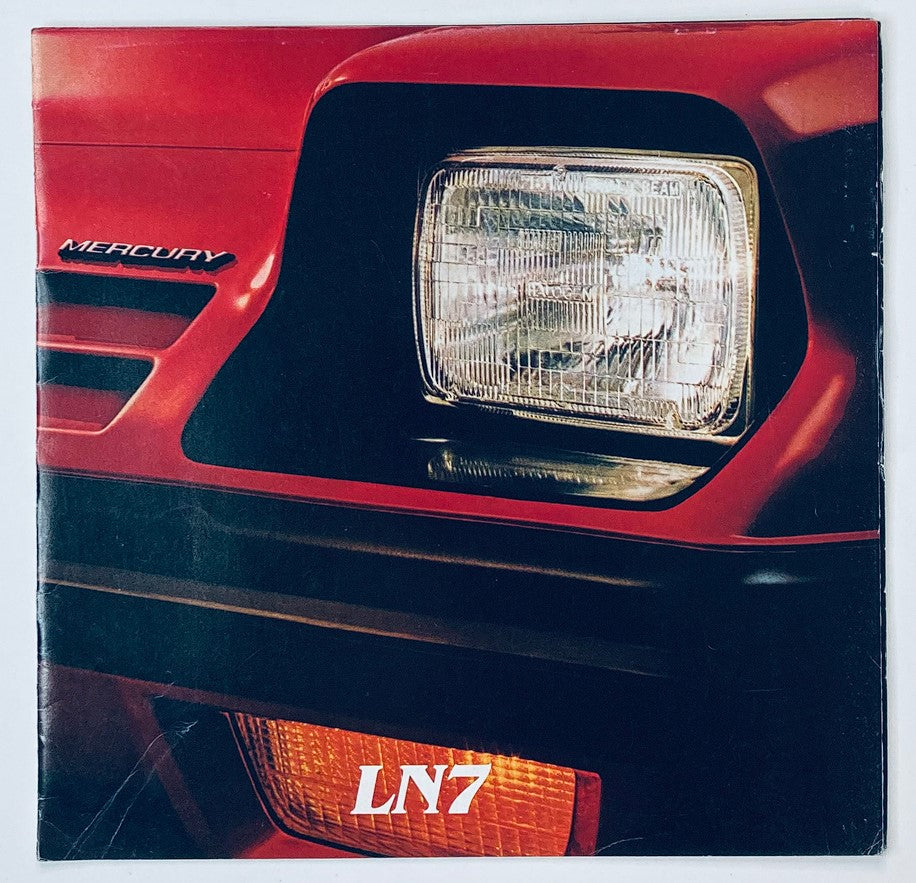 1982 Mercury LNZ Dealer Showroom Sales Brochure Guide Catalog featuring the front cover with a close-up of the LN7 headlight and grille, highlighting its vintage automotive design.