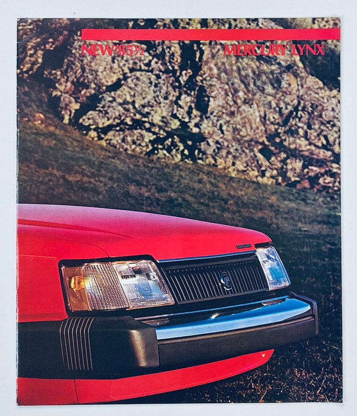 1985 Mercury Lynx Dealer Showroom Sales Brochure Cover showcasing the front grille of the car on a natural background, highlighting the vehicle's design and features.