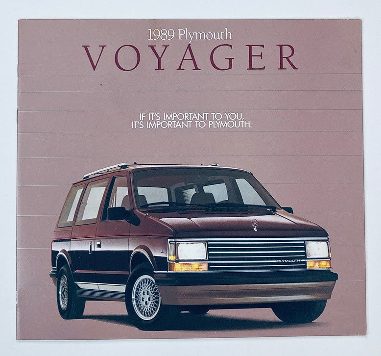 1989 Plymouth Voyager Dealer Showroom Sales Brochure showcasing the iconic minivan design with a maroon color scheme and bold text. Perfect for collectors of vintage automotive memorabilia.