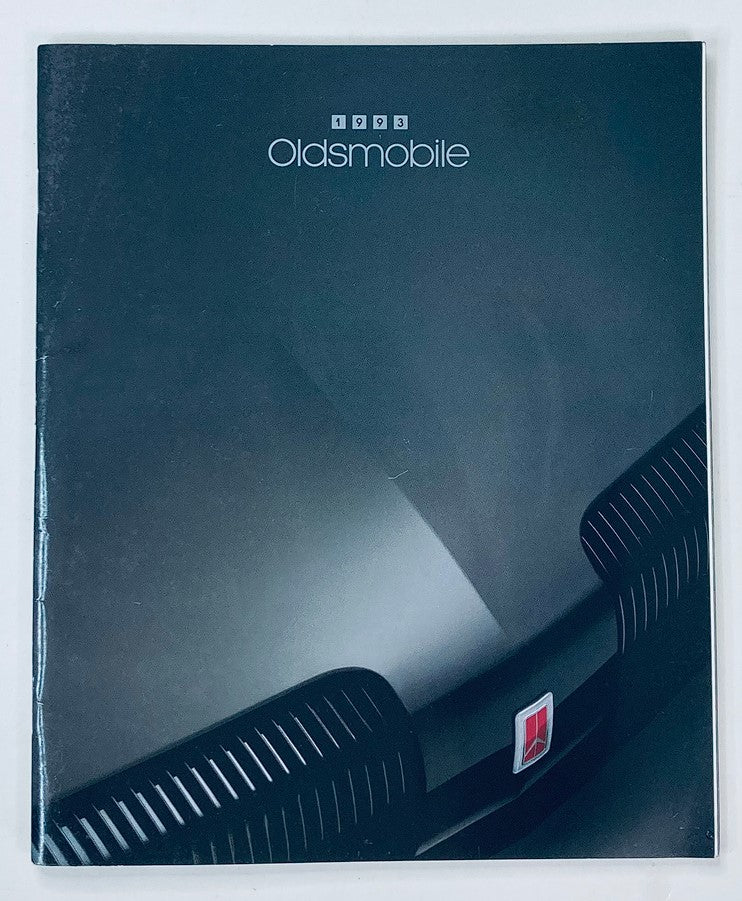 1993 Oldsmobile Dealer Showroom Sales Brochure Guide Catalog featuring a sleek cover design with a prominent Oldsmobile logo and an elegant car grille.
