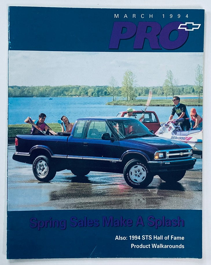 March 1994 Chevrolet Pro Dealer Showroom Sales Brochure Guide Catalog featuring a blue pickup truck by a lake with sales representatives in the background.
