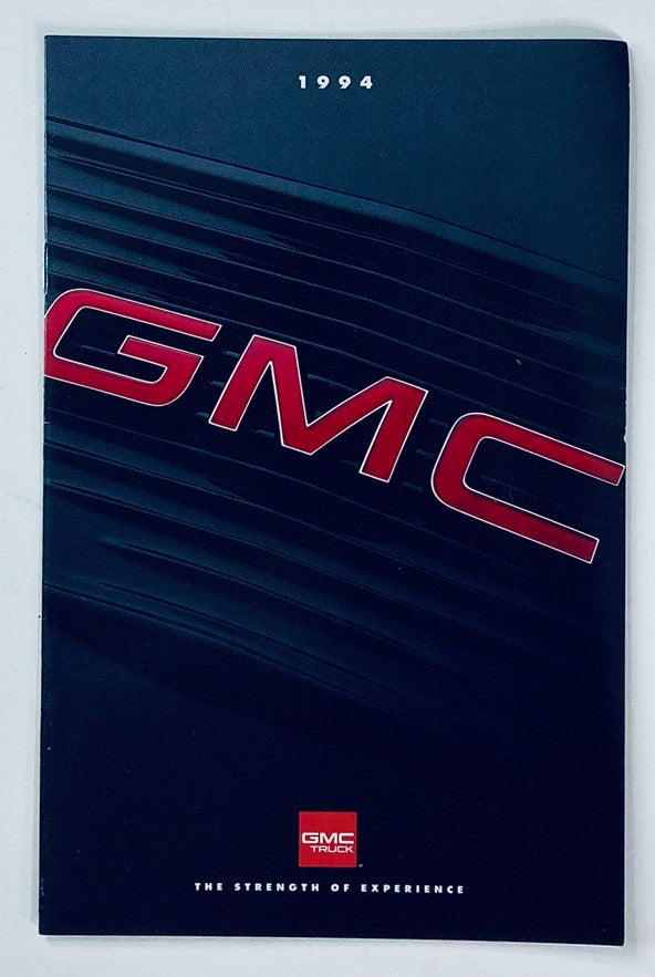 Cover of the 1994 GMC Truck Dealer Showroom Sales Brochure Guide Catalog featuring the GMC logo and sleek design elements.