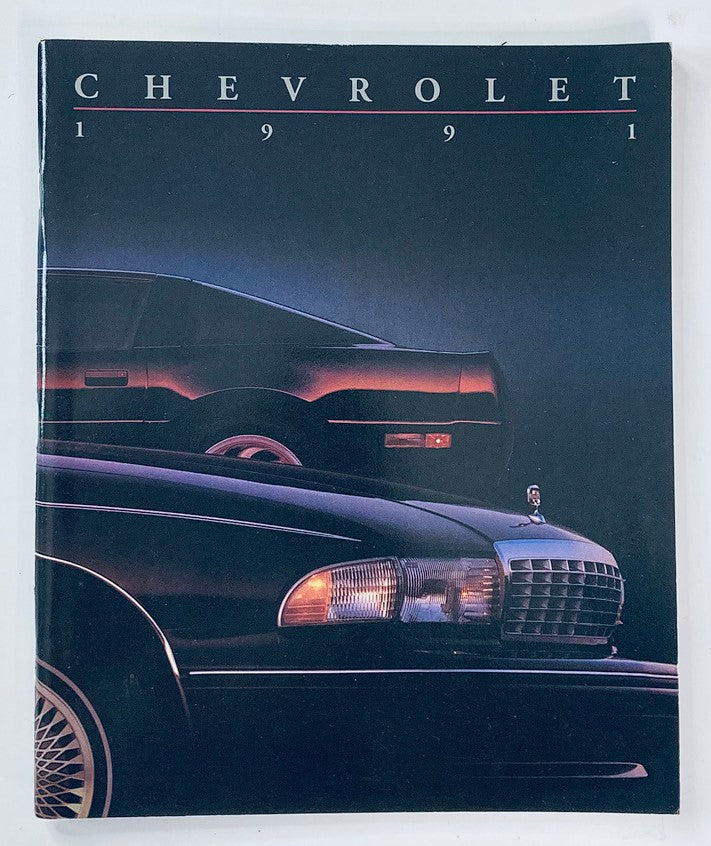 1991 Chevrolet Caprice Dealer Showroom Sales Brochure Guide Catalog featuring a sleek black vehicle in a dramatic lighting setup against a dark background.