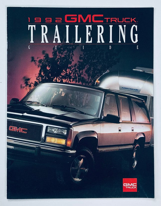 1992 GMC Truck Trailering Dealer Showroom Sales Brochure Guide Catalog featuring a GMC truck parked in front of a trailer, showcasing its design and functionality.