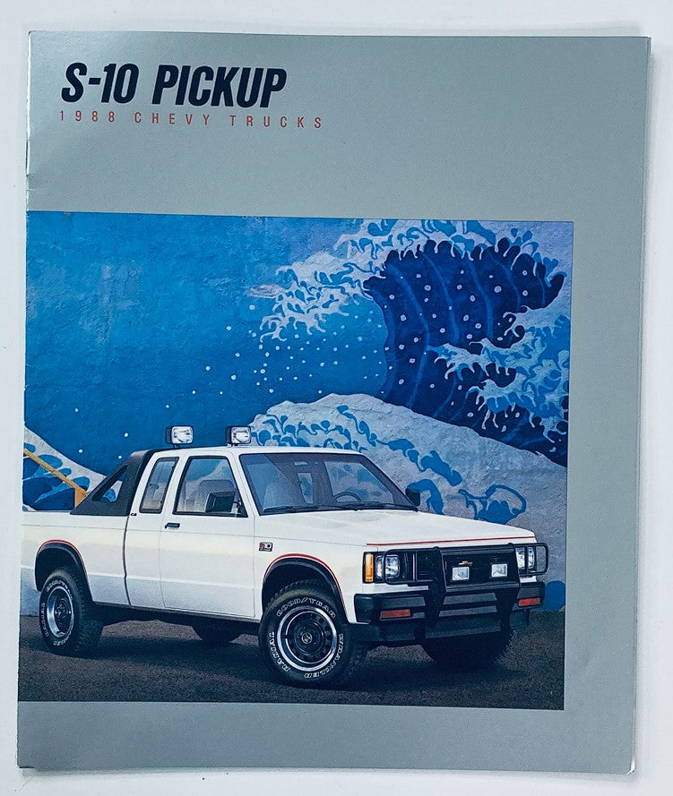 1988 Chevrolet S-10 Pickup Trucks dealer showroom sales brochure cover featuring a white S-10 pickup truck in front of a colorful wave mural.