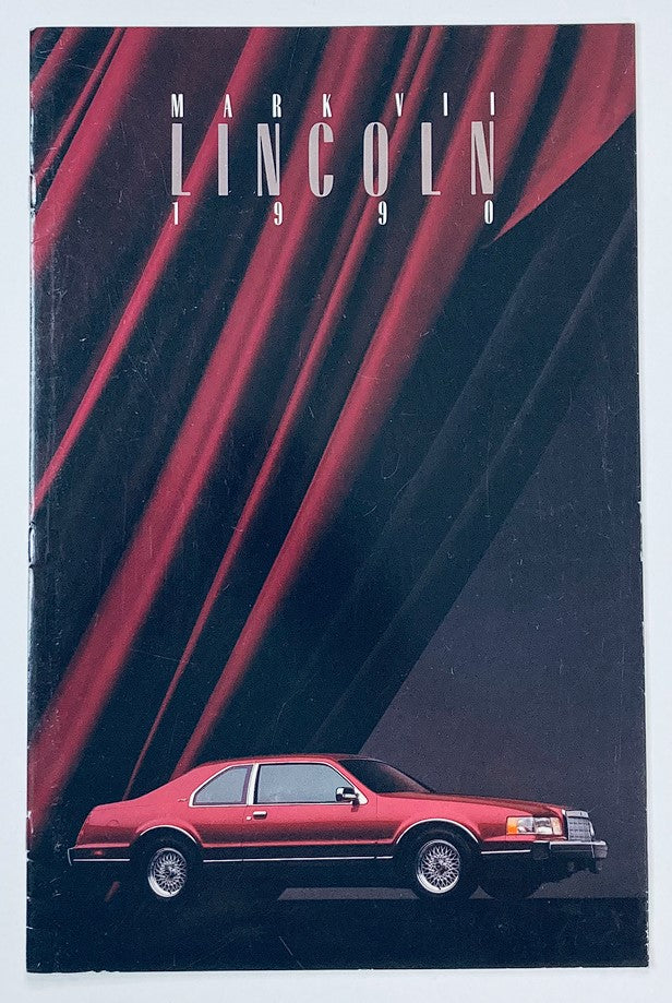 1990 Lincoln Mark VII Dealer Showroom Sales Brochure featuring a sleek red car against a dramatic black and red background.