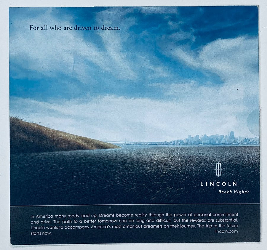 2000s Lincoln Dealer Showroom Sales Brochure Guide Catalog featuring a scenic road leading to a city skyline, symbolizing the journey and aspirations of Lincoln's commitment to excellence.