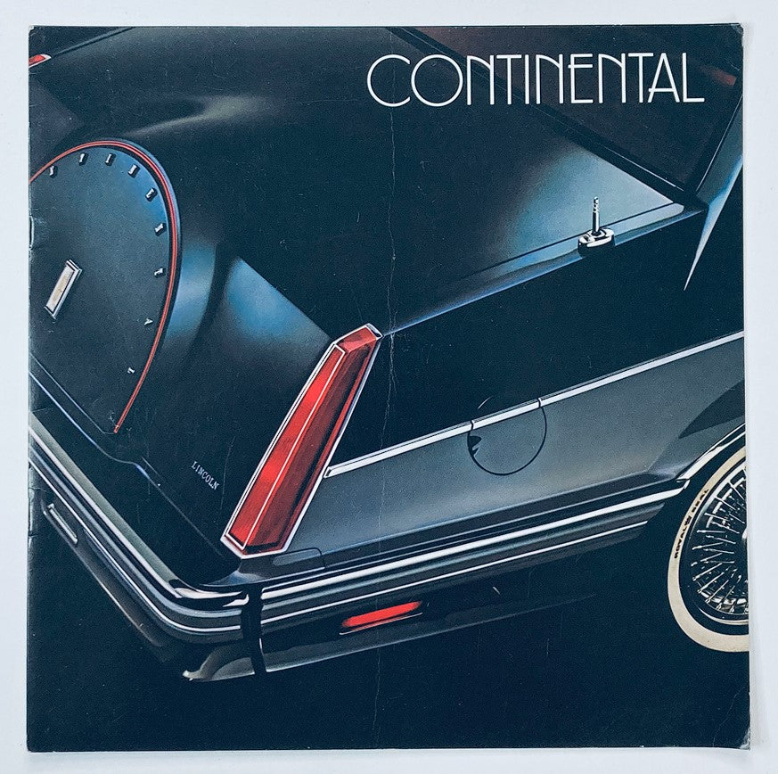 1982 Lincoln Town Car Dealer Showroom Sales Brochure showcasing the sleek design and rear detail of a Lincoln Continental, highlighting its luxury features and aesthetic appeal.