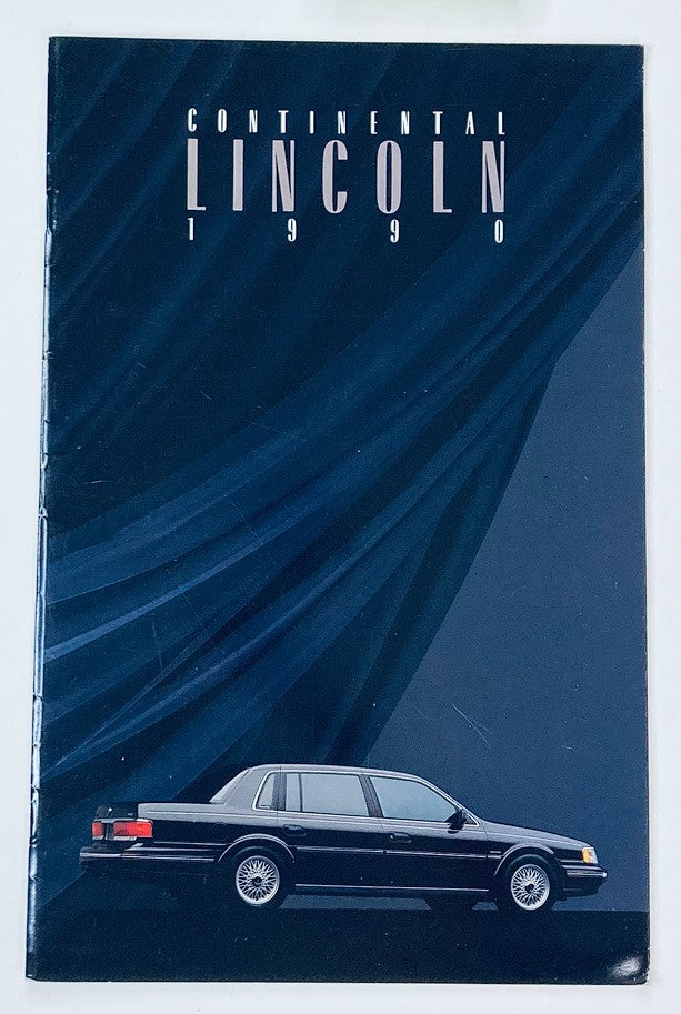 1990 Lincoln Continental Dealer Showroom Sales Brochure featuring a sleek black car design against a dark background. The cover showcases the title 'CONTINENTAL LINCOLN 1990' prominently.