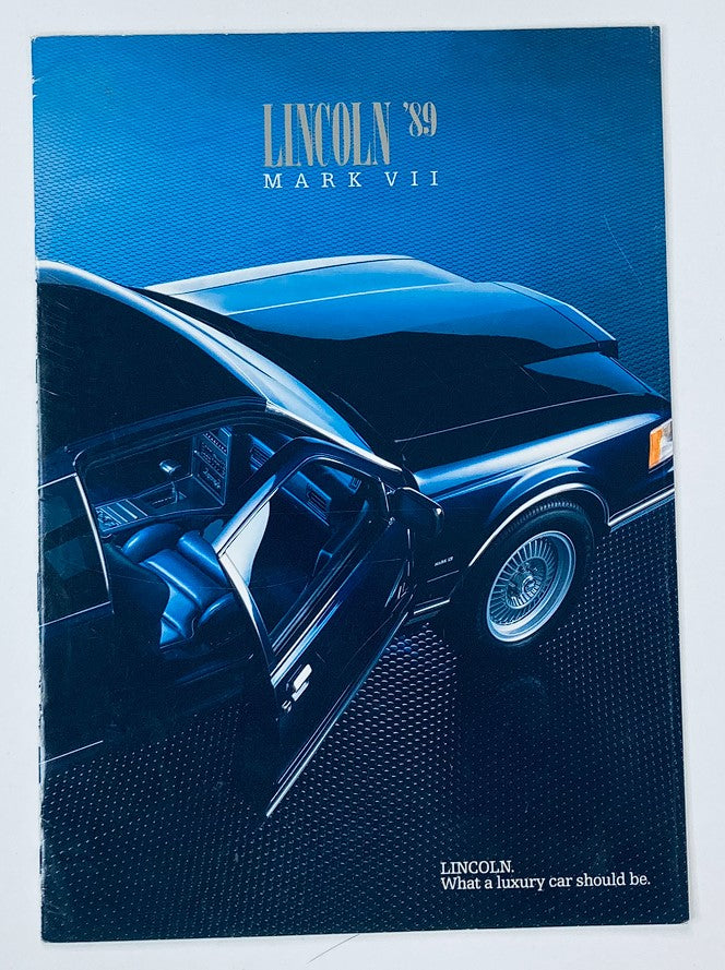 1989 Lincoln Mark VII Dealer Showroom Sales Brochure featuring a stylish view of the car's interior and exterior design, showcasing its luxury features and sleek appearance.
