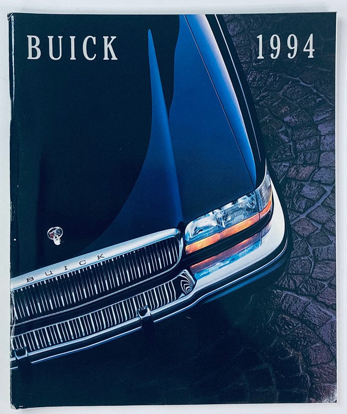 1994 Buick Full Line Dealer Showroom Sales Brochure Guide Catalog cover featuring a sleek Buick car with a prominent grille and modern design against a textured stone background.