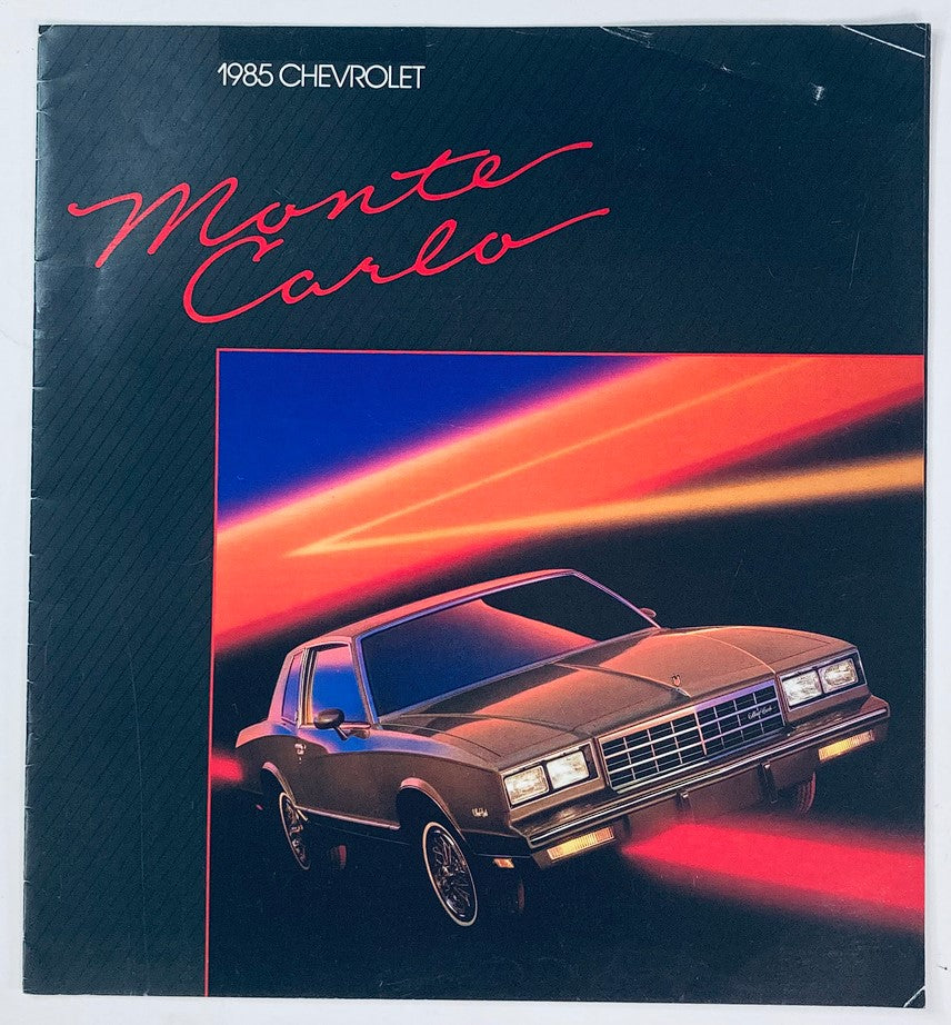 1985 Chevrolet Monte Carlo Dealer Showroom Sales Brochure showcasing the classic car with vibrant graphics and design elements, perfect for collectors and enthusiasts.