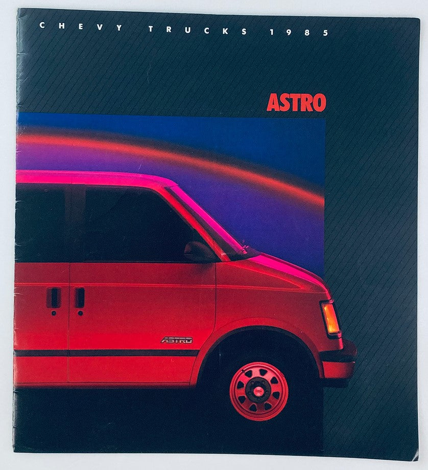 1985 Chevrolet Trucks Astro Dealer Showroom Sales Brochure Guide Catalog featuring a striking cover design with a red Astro van against a dynamic background.