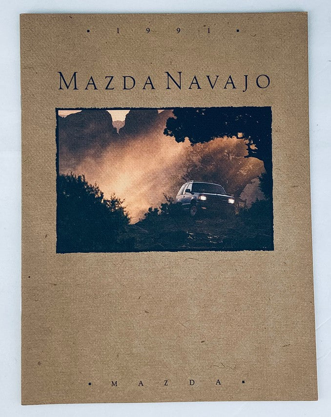 1991 Mazda Navajo Dealer Showroom Sales Brochure Guide Catalog cover featuring a Mazda Navajo vehicle in a natural setting with dramatic lighting.
