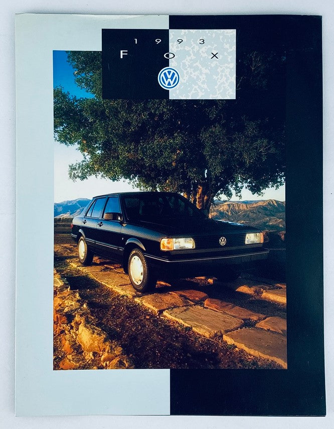 1993 Volkswagen Fox Dealer Showroom Sales Brochure Guide Catalog featuring a black Volkswagen Fox parked under a tree, showcasing its design against a scenic backdrop with mountains.