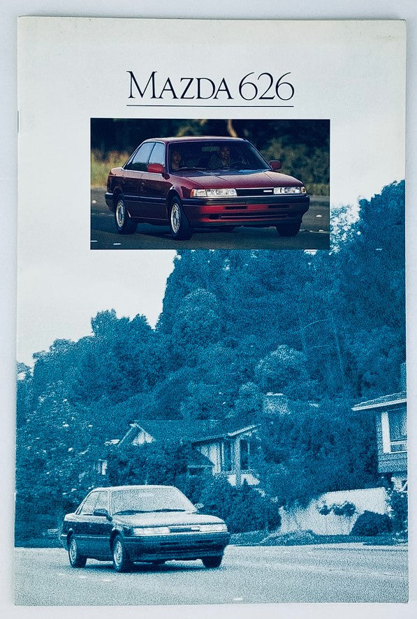 1990 Mazda 626 Dealer Showroom Sales Brochure featuring a red Mazda 626 on the cover, showcasing the vehicle's design and dealership promotional information.