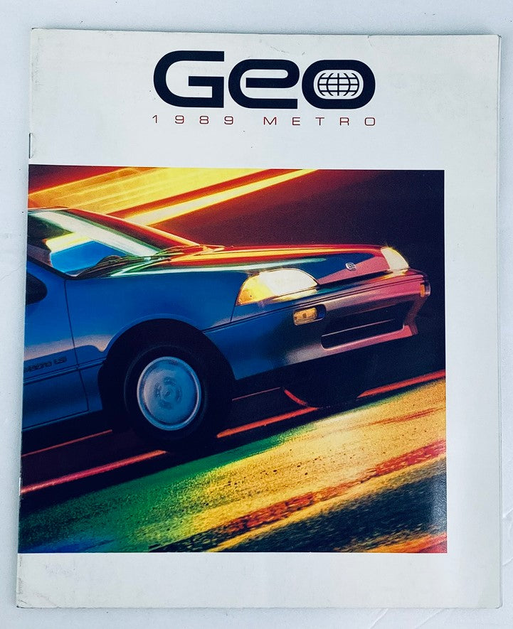 1989 Geo Metro Lineup Dealer Showroom Sales Brochure Guide Catalog showcasing a blue Geo Metro car in a dynamic, colorful setting.