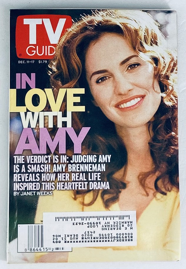 TV Guide Magazine cover dated December 11, 1999, featuring actress Amy Brenneman with the headline 'In Love with Amy'. This vintage issue showcases insights into television programming from the late '90s.