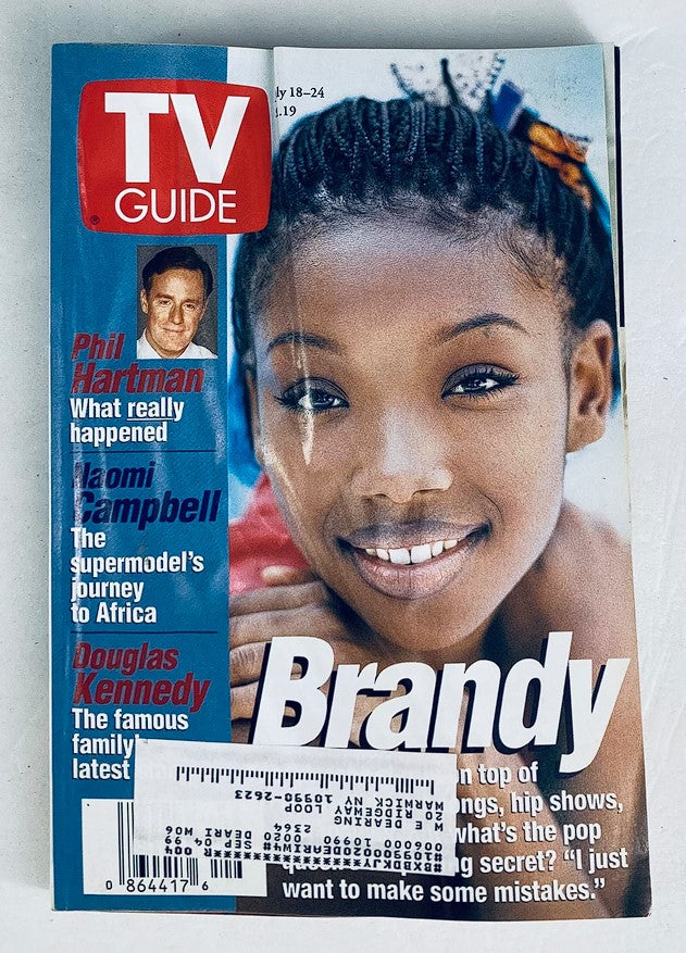 Cover of TV Guide Magazine July 18, 1998 featuring Brandy, with additional text about Phil Hartman, Naomi Campbell, and Douglas Kennedy. A nostalgic piece highlighting entertainment in the late 90s.