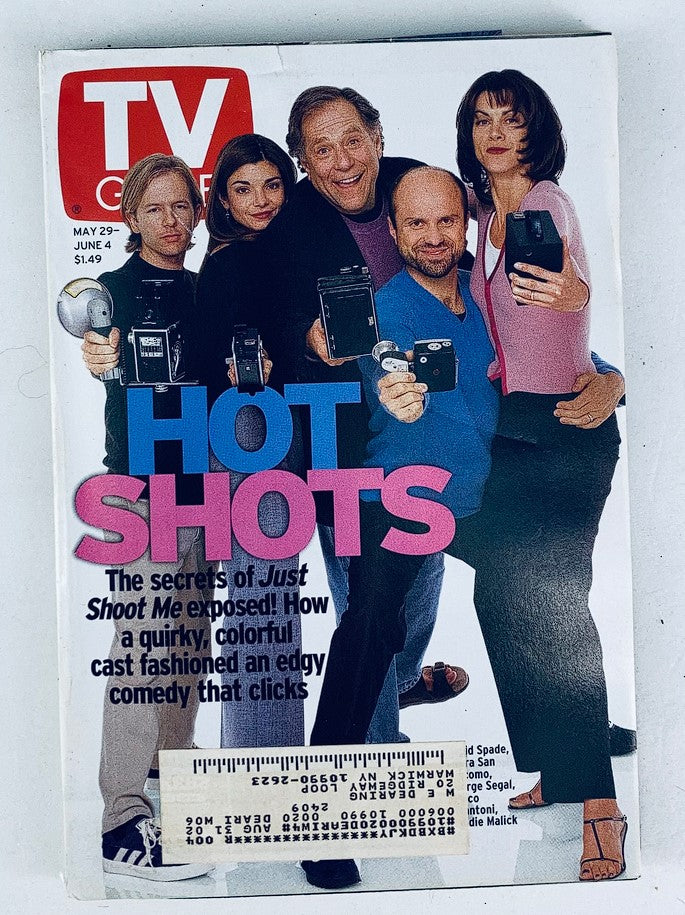 TV Guide Magazine May 29, 1999 featuring the cast of Just Shoot Me on the cover, showcasing a vibrant group photo with actors holding cameras and posing playfully, highlighting the show's quirky, colorful ensemble.