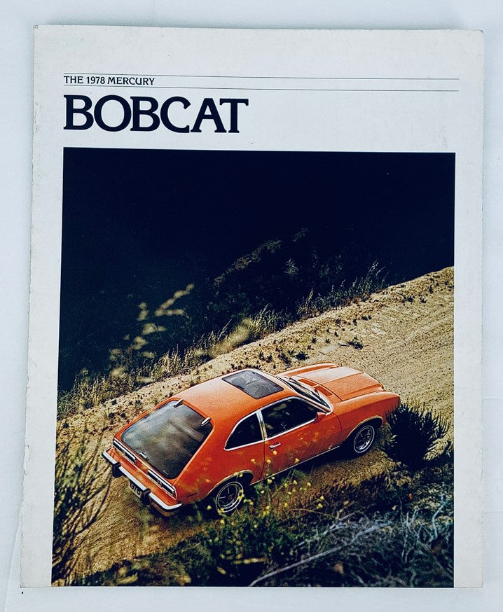 1978 Mercury Bobcat Dealer Showroom Sales Brochure featuring an aerial view of the orange Mercury Bobcat car on a dirt road, showcasing the vehicle's design and scenic surroundings.