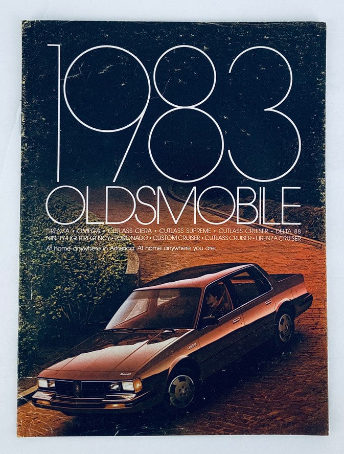 1983 Oldsmobile Firenza, Omega Dealer Showroom Sales Brochure showcasing the vehicle's features, with a sleek car image on the cover against a stylish backdrop.